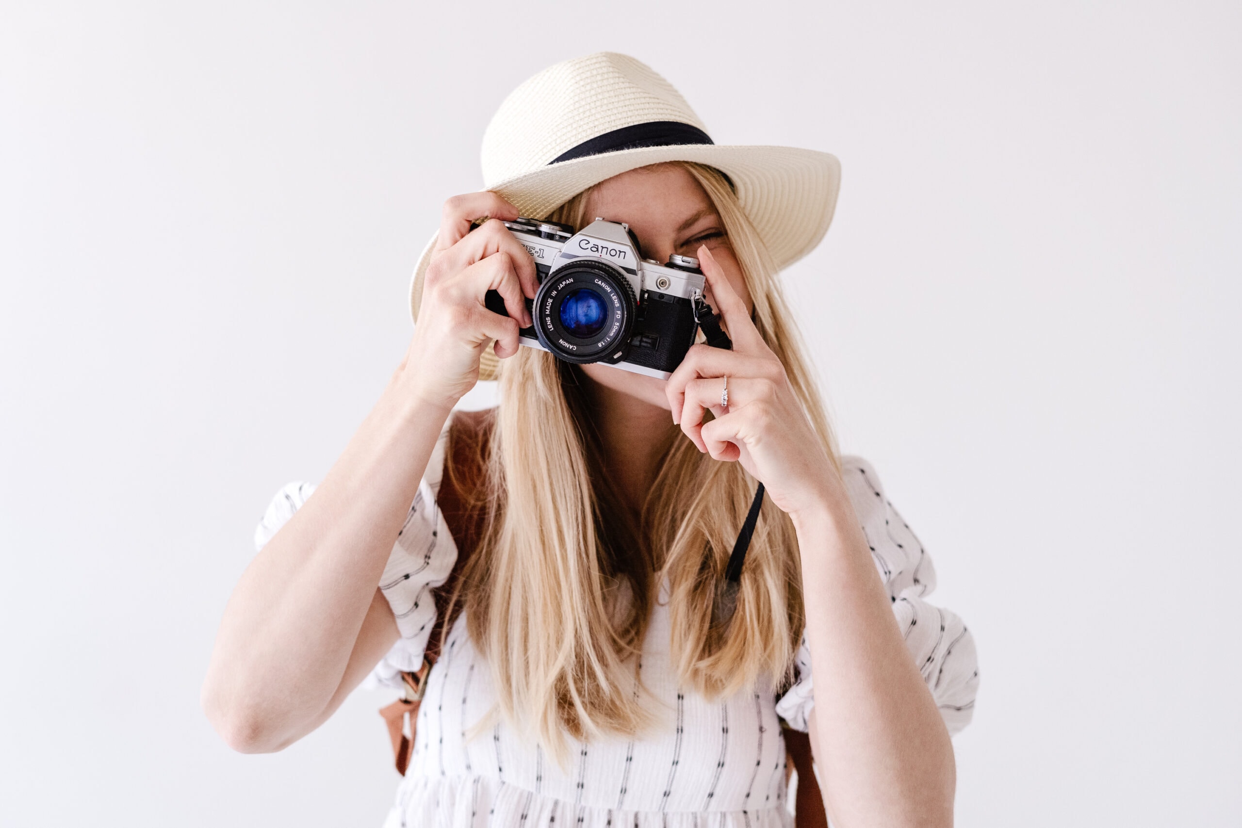 person holding camera and taking picture